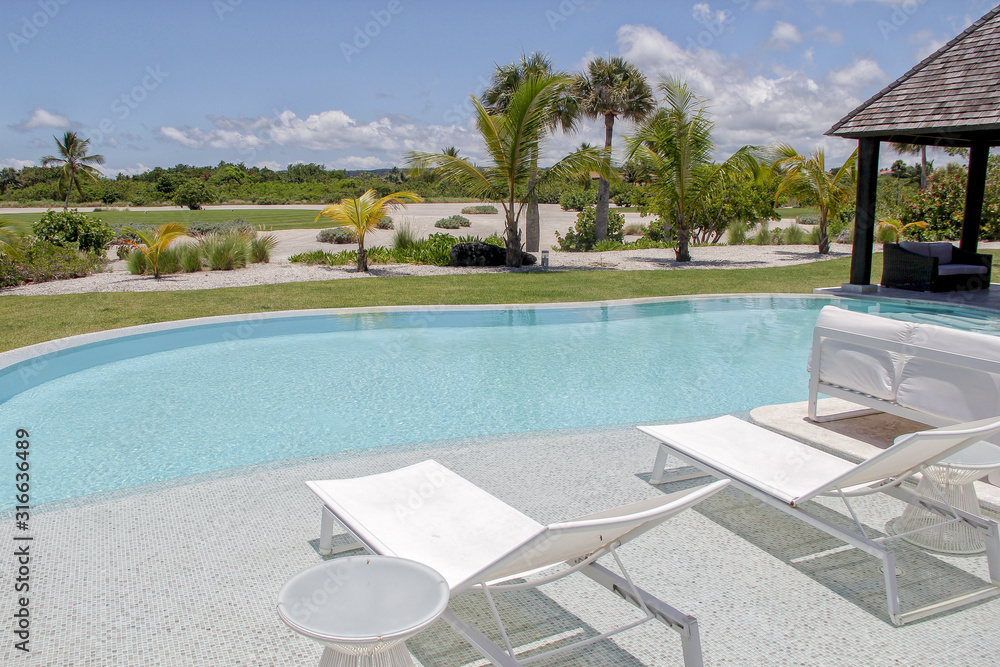 Hermosa area de la piscina con un estilo blanco limpio, estilo de vida, villas en el casa de campo Hermosa area de la piscina con un estilo blanco limpio, estilo de vida, villas en el casa de campo