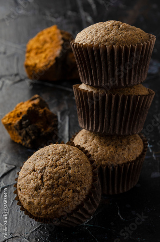 Chaga muffins - Superfood Trend on dark background