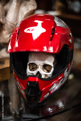 A helmet complements the skull in protecting the human brain old vintage house items sale garage storage container uk manchester london space for text advertisement © Valentin