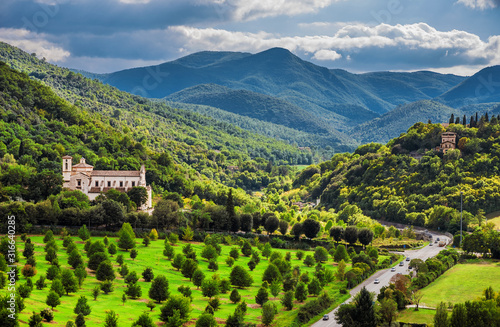Valokuva View of the green and beautiful Umbria countryside with the St Peter Extra Moeni