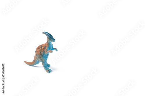 Toy dinosaurs isolated on white background.Copy space