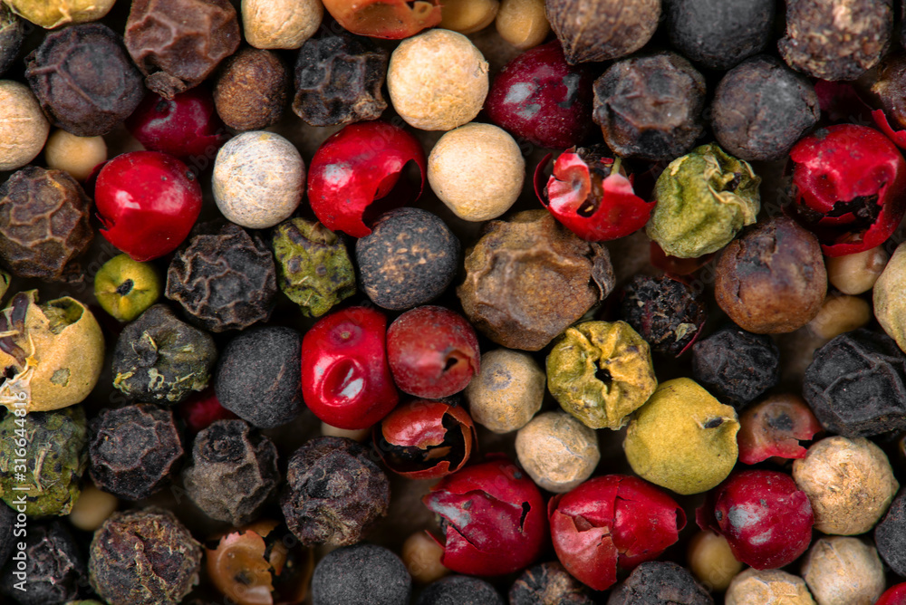 Closeup of mixed pepper background. Top view. Closeup of mixed pepper background. Top view.