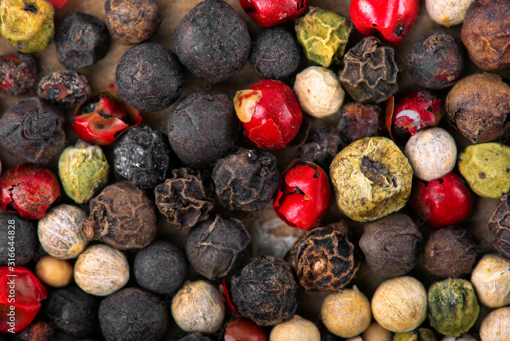 Closeup of mixed pepper background. Top view. Closeup of mixed pepper background. Top view.