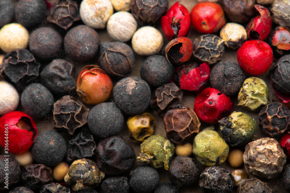 Closeup of mixed pepper background. Top view. Closeup of mixed pepper background. Top view.
