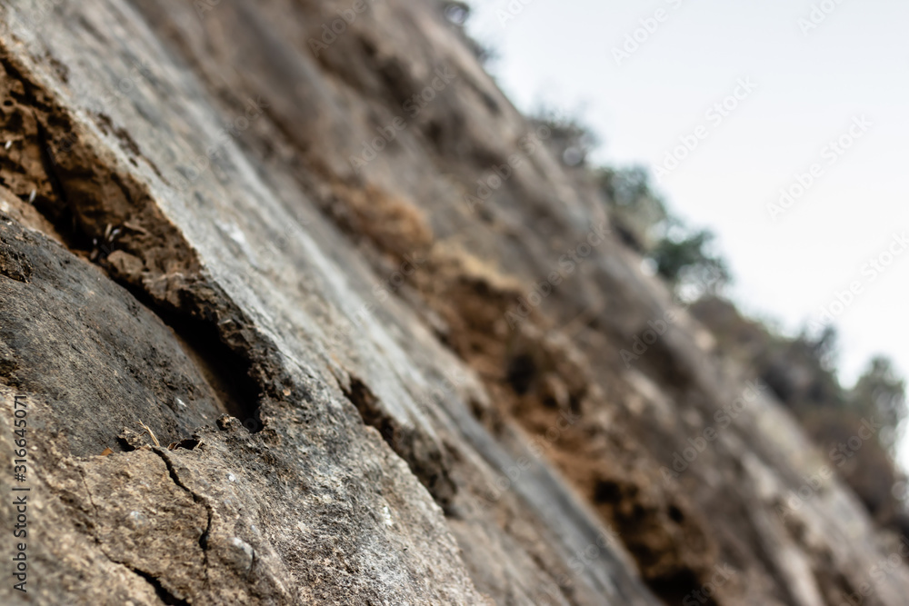 an artistic edgy shoot from a mountain - solid and cracked stones looks very well an artistic edgy shoot from a mountain - solid and cracked stones looks very well