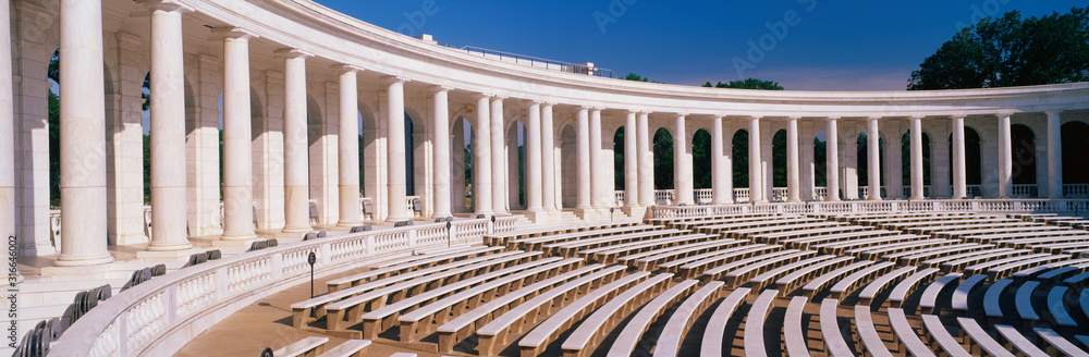 These are the marble columns and the amphitheatre at Arlington National Cemetery. Below the columns are bench seats.