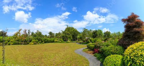 Japanese garden with walkway. © MikeBiTa