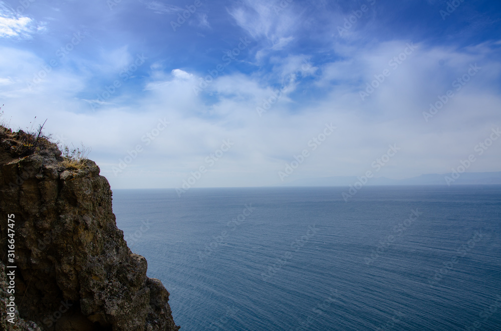 Sea and mountains. Seascape rocky coast. Travel and adventure. Sea and mountains. Seascape rocky coast. Travel and adventure.