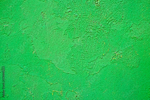 Light green rough and grungy backdrop pattern.