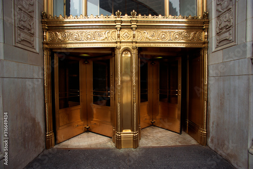 These are the golden front doors to the Wrigley Building. photo