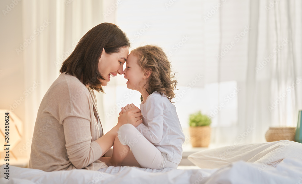 girl and her mother enjoy sunny morning girl and her mother enjoy sunny morning
