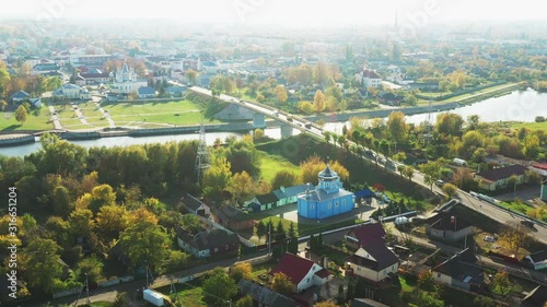 Kobryn, Brest Region, Belarus. Cityscape Skyline In Autumn Sunny Day. Bird's-eye View Of St. Nicholas Church And Church of St. Alexander Nevsky. Famous Historic Landmark photo