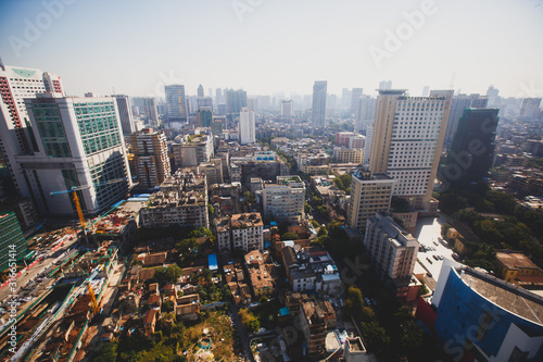 Beautiful wide-angle aerial view of Guangzhou   Guangdong  China with skyline and scenery beyond the city  seen from the observation deck