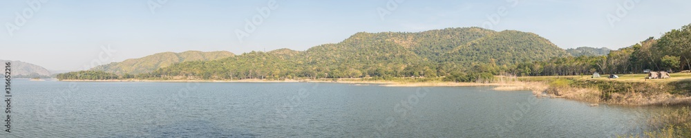 Panorama image of Tropical landscape view of Lake and Mountain at National Park in morning time.