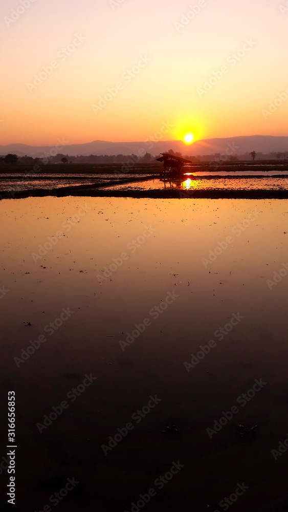 Reflection landscape, Sunrise in the morning at Chaing Rai Thailand.
