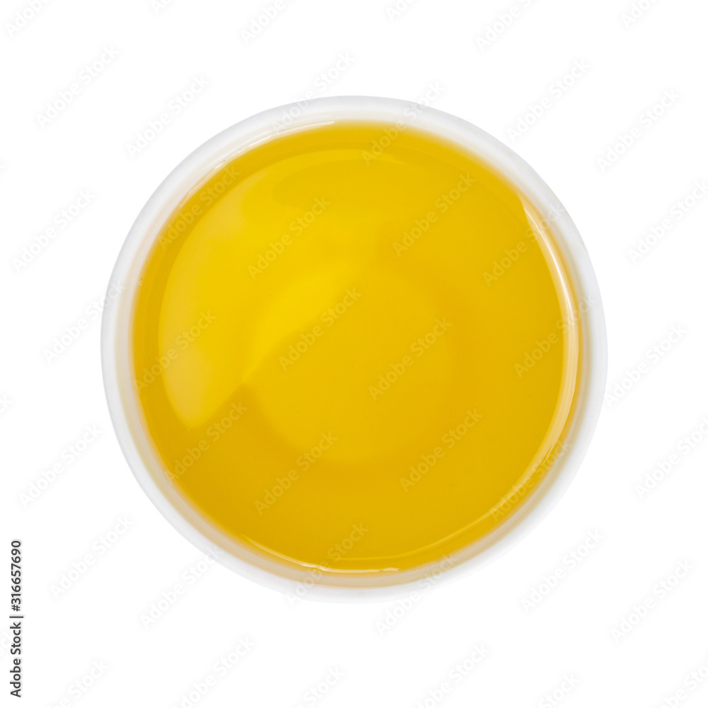 Top view of white Glass with oil on white background Top view of white Glass with oil on white background