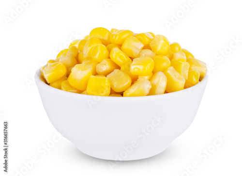 Boiled corn seeds in white bowl isolated on white background