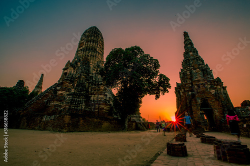 Background of Wat Chai Watthanaram in Phra Nakhon Si Ayutthaya province  tourists are always fond of taking pictures and making merit during holidays in Thailand.