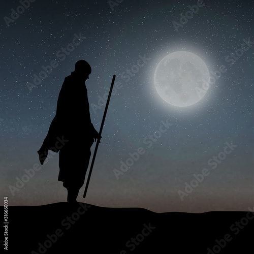 An Asian Monk Soldier Holding The Stick Under The Moonlight