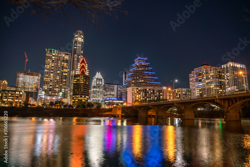 View of the Austin Skyline Reflecting on Lady Bird Lake At Night