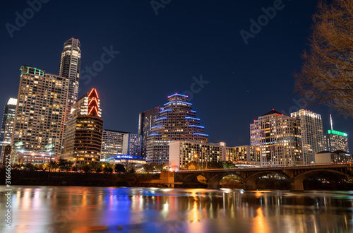 View of the Congress Ave Bridge With The Illuminated  Downtown Austin In the Background