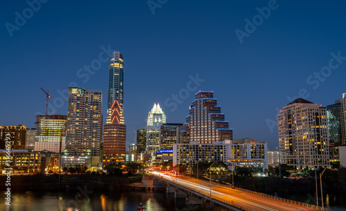 Aerial View of Downtown Austin At Night With Congress Bridge in the Foreground