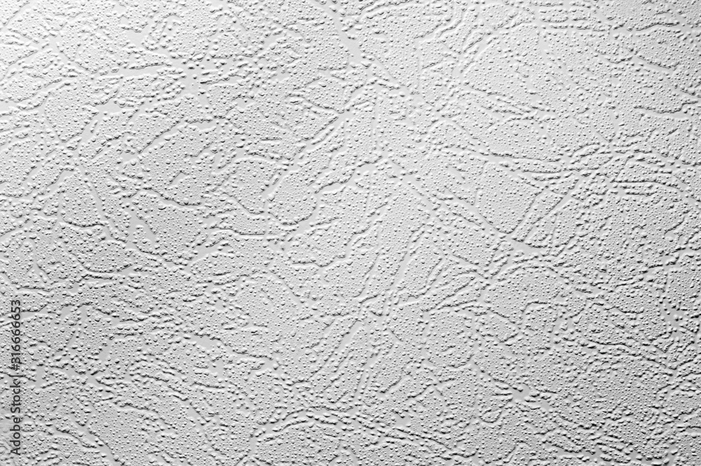 white texture of the wall with putty, cracks and small holes made by putty white texture of the wall with putty, cracks and small holes made by putty