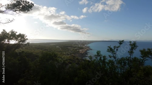 Partly cloudy sky over Sa Pujada Path in Formentera, Spain. Static shot. photo