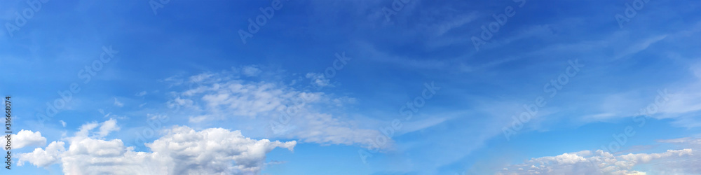 Panorama sky with cloud on a sunny day. Beautiful cirrus cloud. Panoramic image. Panorama sky with cloud on a sunny day. Beautiful cirrus cloud. Panoramic image.