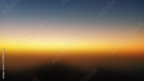 Blurred sunrise background in the early morning light.