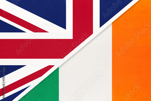 United Kingdom vs Republic of Ireland national flag from textile. Relationship between two european countries.