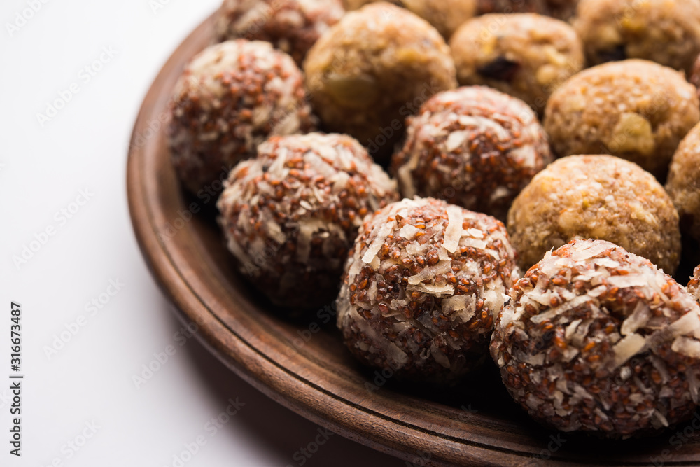 Group of Dink, Gond , Aliv, Halim laddu, Laddoo, Ladu, Ladoo Made using Garden cress Seed and edible gum, sweet food Group of Dink, Gond , Aliv, Halim laddu, Laddoo, Ladu, Ladoo Made using Garden cress Seed and edible gum, sweet food