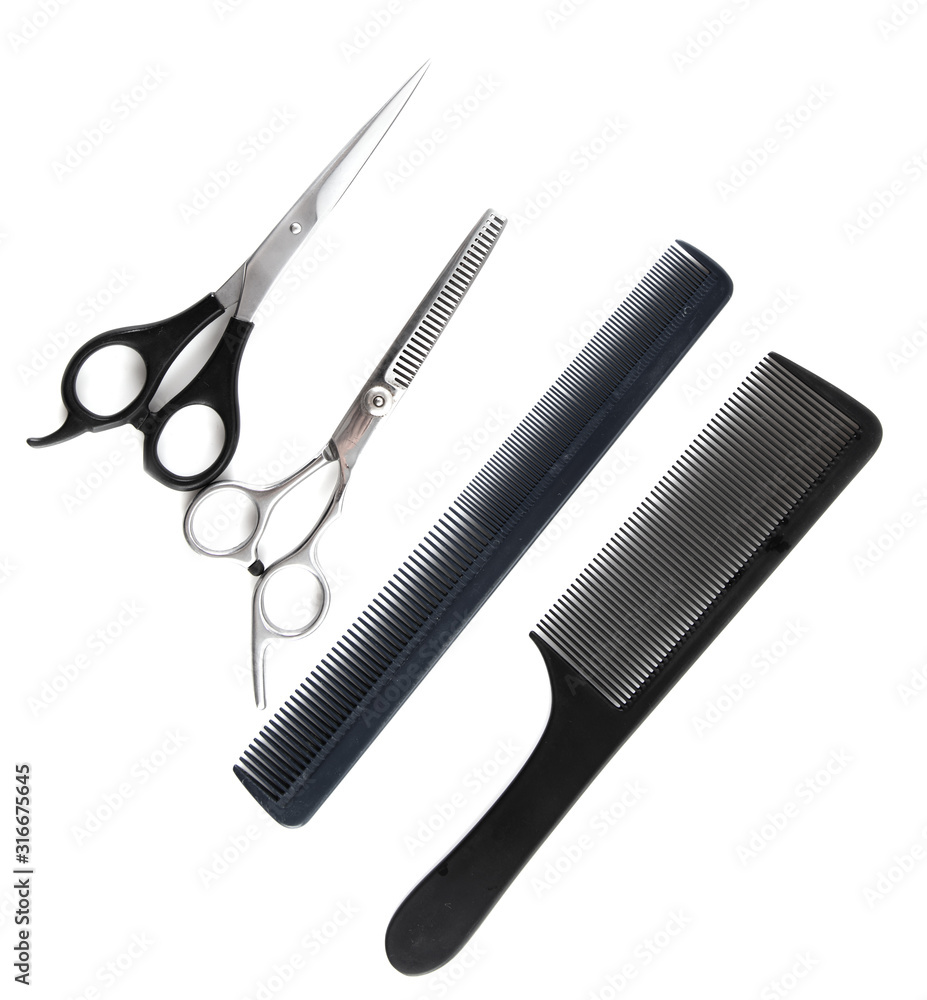 Obraz premium Scissors and combs for cutting hair
