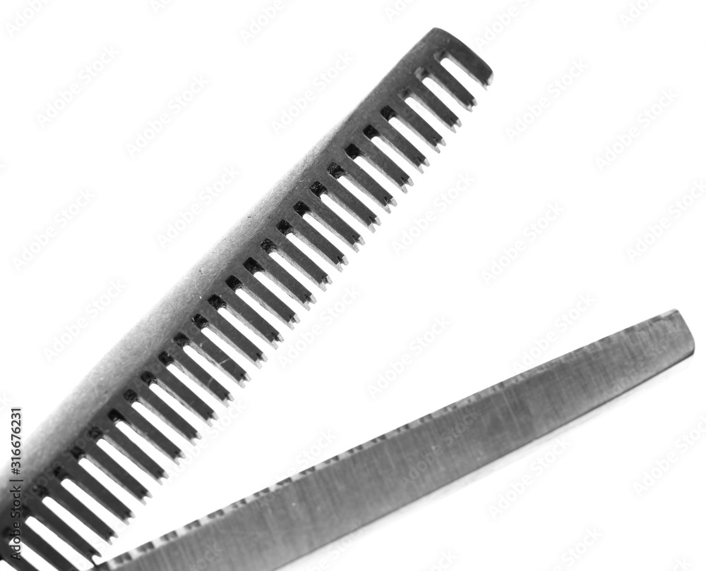 Thinning shears for haircuts isolated on a white Thinning shears for haircuts isolated on a white