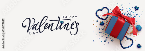 Happy Valentine's Day. Horizontal banner, header template for the website. Romantic realistic design elements, gift box, metal hearts strewn with sparkles confetti. Handwritten calligraphy lettering.