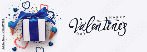 Happy Valentine's Day. Horizontal banner, header template for the website. Romantic realistic design elements, gift box, metal hearts strewn with sparkles confetti. Handwritten calligraphy lettering.