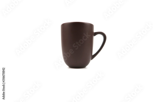 Brown ceramic mug isolated on white background