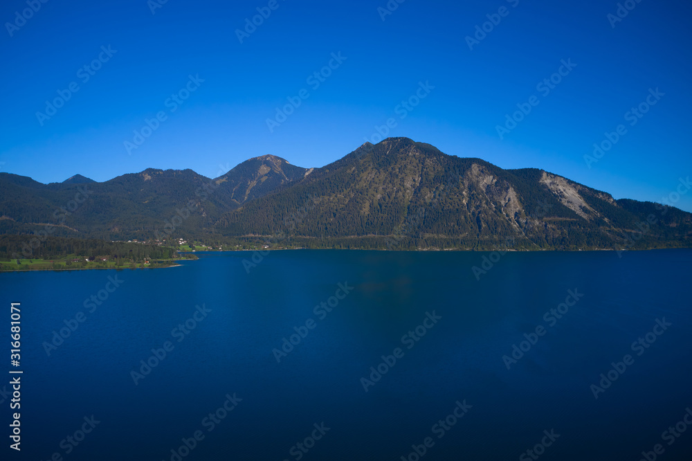 Lake Walchensee, Germany. Clear blue sky, morning on the lake. Lake in Germany. Aerial view