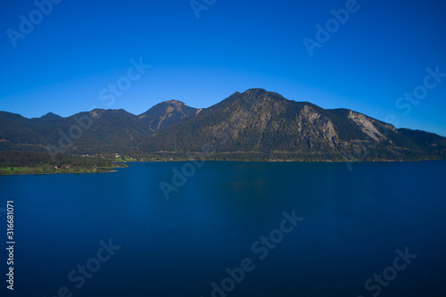 Lake Walchensee, Germany. Clear blue sky, morning on the lake. Lake in Germany. Aerial view © Berg