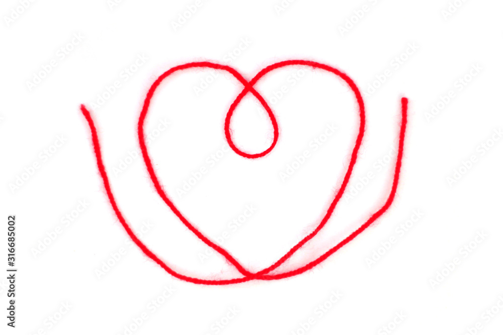Red thread in shape of heart on white isolated background. Stock photo for Valentine's Day with place for text. For web, print, greeting cards and invitations, wallpaper and background. Red thread in shape of heart on white isolated background. Stock photo for Valentine's Day with place for text. For web, print, greeting cards and invitations, wallpaper and background.