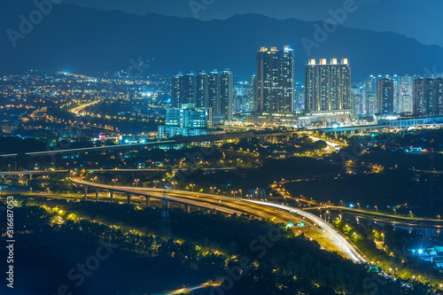 Aerial view of Yuen Long district, New Territories in Hong Kong at night