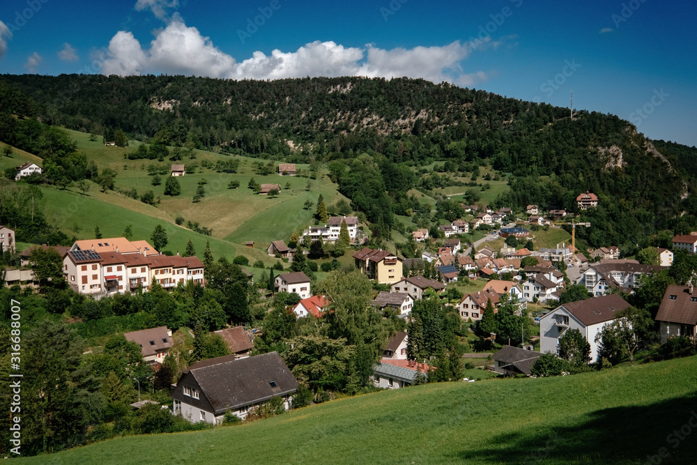 Summer view of a beautiful apline village in Switzerland