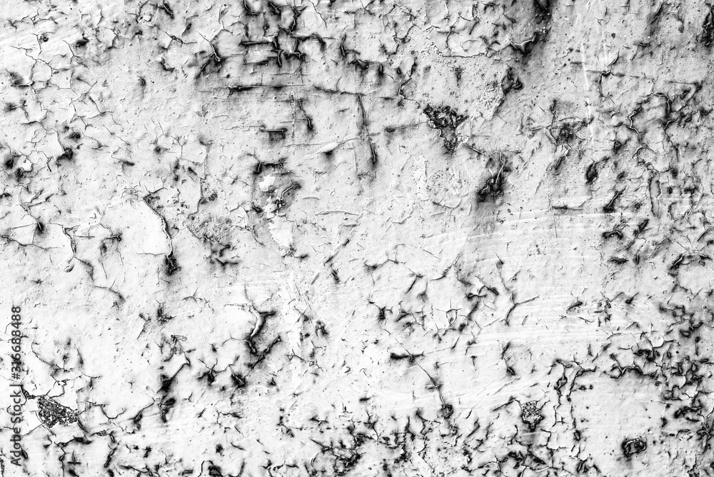 Texture of a metal wall with cracks and scratches which can be used as a background Texture of a metal wall with cracks and scratches which can be used as a background