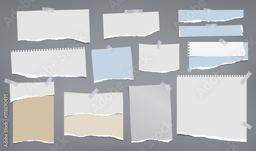 Set of torn white and blue note, notebook paper strips and pieces stuck with sticky tape on dark grey background. Vector illustration