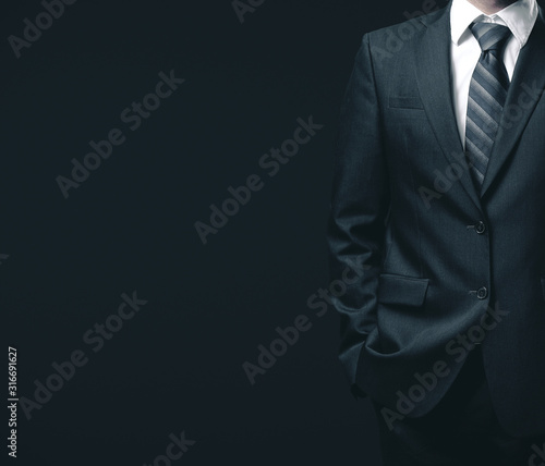 Valokuva Businessman in black suit