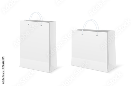 Paper bags. Empty cardboard packet on white background.