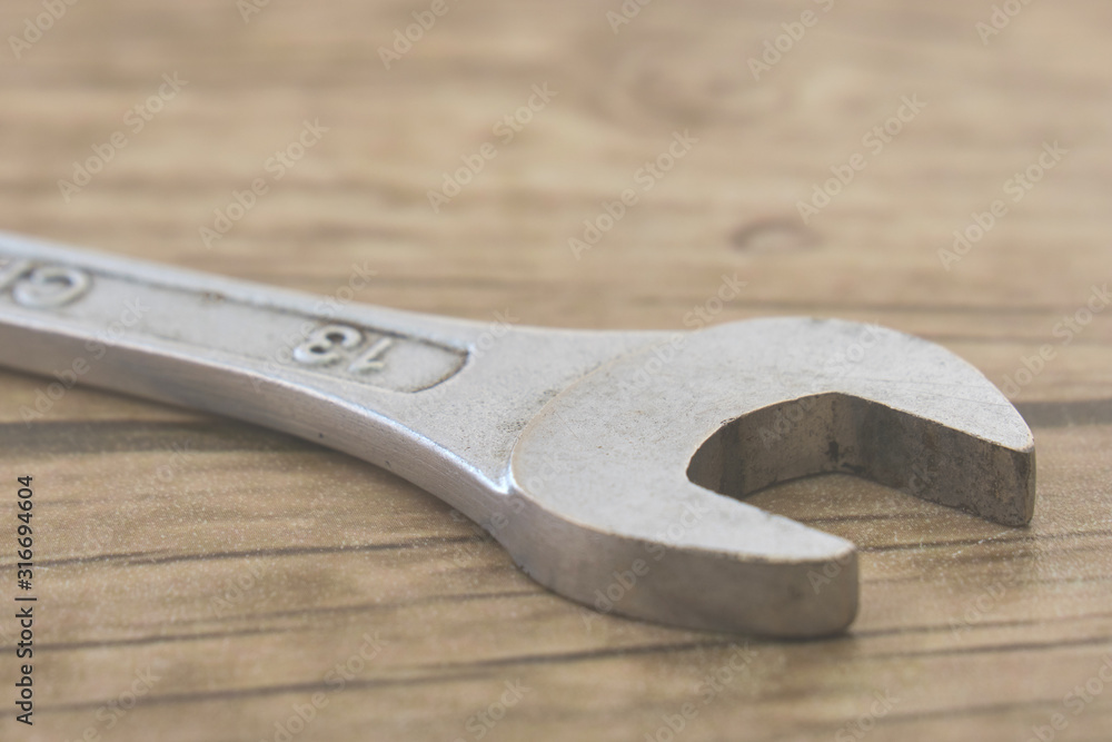 old silver metal wrench