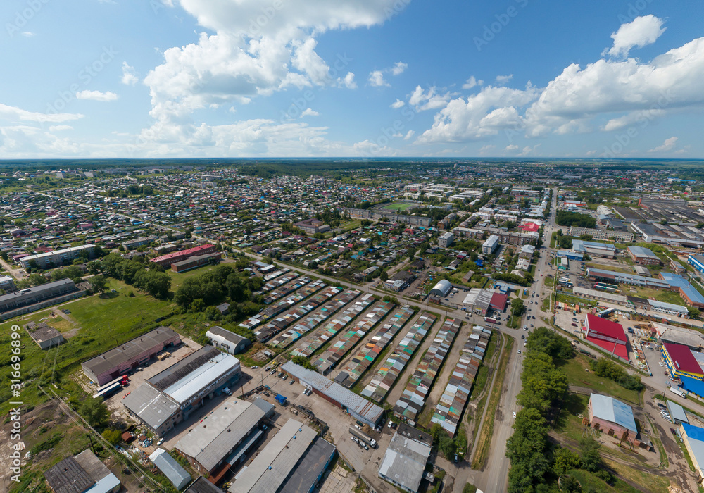 Obraz premium Aerial view of Irbit city, garages and private houses. Russia, Sverdlovsk region, summer, sunny day