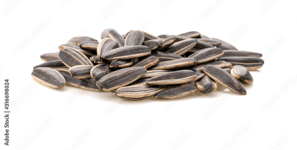 Seed of Sunflower isolated on white background.Sunflower seeds pile against white background.