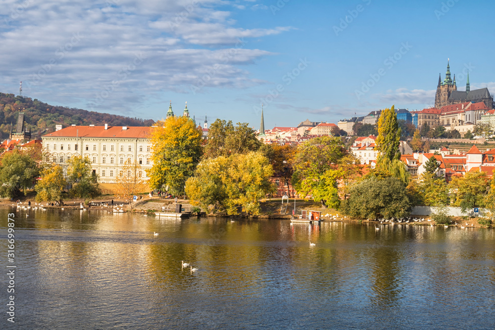 View of colorful old town and Prague castle with river Vltava, Czech Republic